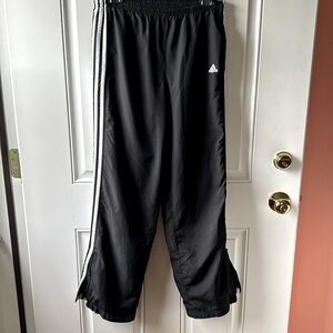 “Adidas” windbreaker athletic pants with a zipper on each legs and pockets